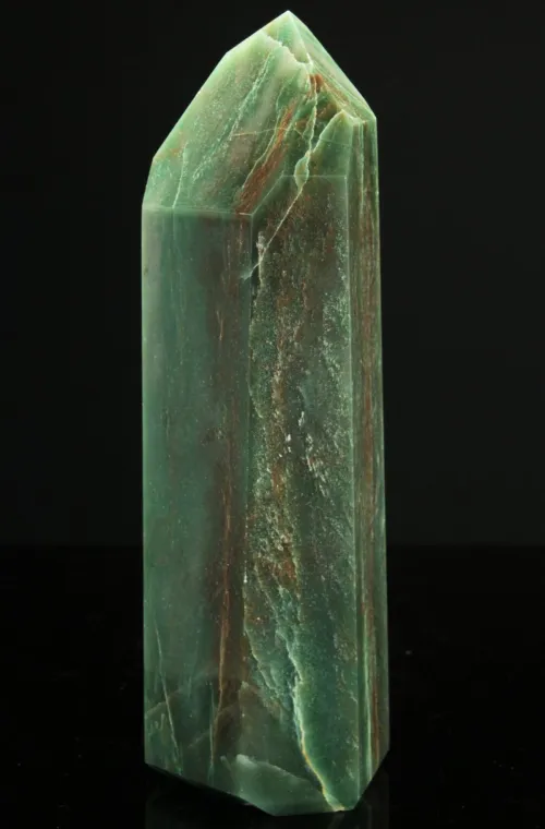 Aventurine color chart demonstrating green fuchsite, blue rutile, and peach hematite varieties