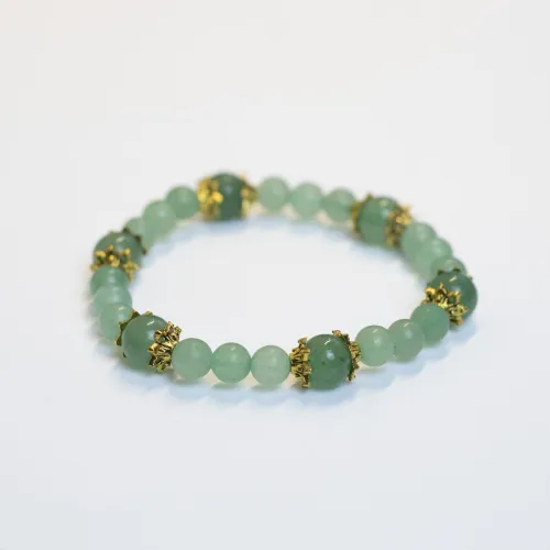 Close-up of scratch testing jade versus aventurine using common household objects